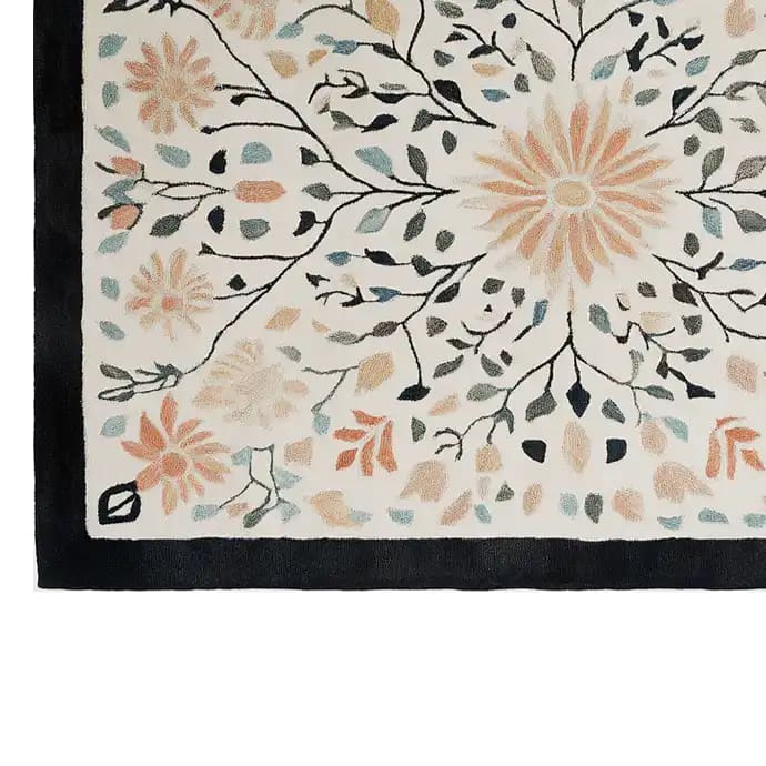Beautiful hand-tufted wool area rug featuring a floral design with pastel colors on a light background, perfect for enhancing living room spaces. This elegant floral rug adds a touch of nature-inspired beauty to any area, making it an ideal choice for those seeking quality area rugs for living rooms.