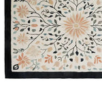 Beautiful hand-tufted wool area rug featuring a floral design with pastel colors on a light background, perfect for enhancing living room spaces. This elegant floral rug adds a touch of nature-inspired beauty to any area, making it an ideal choice for those seeking quality area rugs for living rooms.