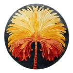 Vibrant Sunset Palm Hand Tufted Round Rug featuring a striking palm design in shades of yellow, orange, and red, perfect as an area rug for both dining room and living room settings. This wool rug adds an artistic touch to dining room carpets and living room area rugs.