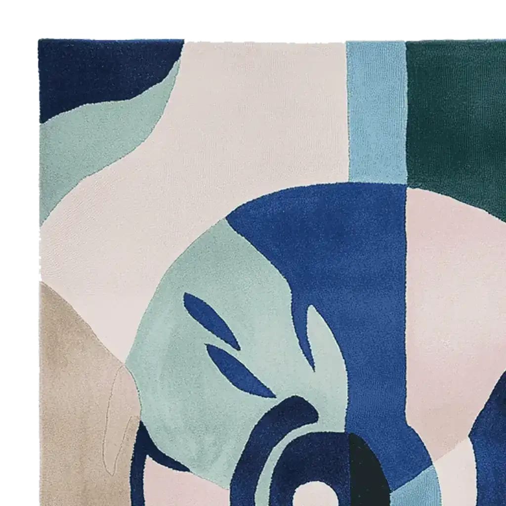 This image showcases a vibrant Surreal Vision Hand Tufted Area Rug, perfect for adding a contemporary touch to any living room. The abstract design features bold blue, teal, and neutral tones, making it an ideal wool rug for those seeking stylish area rugs for living room. Sized approximately 8x10, this rug combines artistry with function.