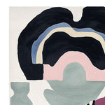 A stunning Surrealist Mind Garden hand-tufted area rug showcasing an abstract design with bold, contemporary shapes in black, blue, beige, pink, and green. Perfect for adding a modern touch to living room spaces, this wool rug is a striking example of contemporary rugs for living rooms.