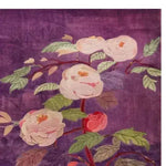 Elegant Swan Serenity Wool Hand Knotted Area Rug featuring a vibrant floral design. The rug showcases large, detailed blossoms with green leaves on a rich purple background, ideal for adding a touch of luxury to dining room carpets. Perfect wool rug for enhancing any dining room decor.