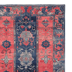 This image showcases a beautifully designed Tale in Crimson Hand Tufted Area Rug, featuring intricate vintage patterns in rich crimson and deep blue hues. Perfect for adding a touch of elegance to any living room, this wool rug is ideal for those seeking stylish living room rugs in an 8x10 size.