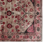 Top view of a Tales of Persia Knotted Wool Rug showcasing an intricate floral pattern in rich red and beige tones, perfect for large living room spaces. This elegant area rug brings a touch of classic Persian design to any home decor.