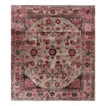 A beautifully crafted Tales of Persia Knotted Wool Rug, showcasing an intricate floral design. This large area rug features a harmonious blend of red and earthy tones, perfect for enhancing living room decor. Ideal for those seeking elegant floral rugs to complement their space.