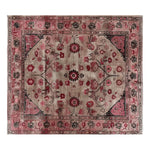 The Tales of Persia Knotted Wool Rug showcases an intricate floral design with rich red and beige tones, perfect for adding elegance to large living room spaces. This area rug combines traditional Persian artistry with modern durability, making it an ideal choice for those seeking stylish area rugs for living rooms.