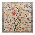 Top view of a Tangled Blossoms Knotted Wool Rug featuring a beautiful floral pattern. This area rug is perfect for enhancing the aesthetic of living rooms. Sized 8x10, the wool rug showcases vibrant flowers in shades of red, orange, and yellow against a neutral background, making it an ideal choice for any decor.