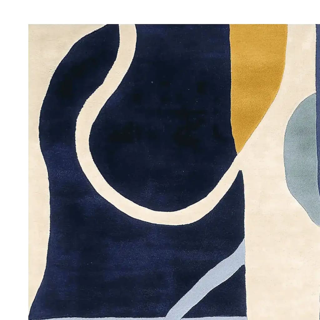 A vibrant Tangled Flow Form Hand Tufted Rug showcasing an abstract design with bold, curving lines in navy, mustard, and gray on a cream background. Perfect as an area rug for a contemporary living room, this 8x10 wool rug adds a splash of modern art to your space.