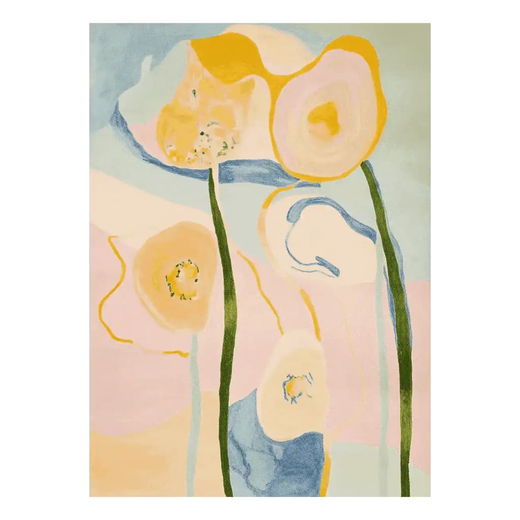 A vibrant area rug featuring an abstract floral pattern with soft pastel colors, perfect for adding a touch of contemporary style to any living room. This hand-tufted wool rug showcases large flowers in shades of pink, yellow, and blue, ideal for those seeking large living room rugs with a modern aesthetic.