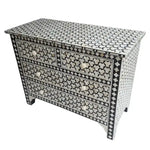 Targua bone inlay chest of 4 drawers, black ground with white star and quatrefoil mosaic pattern, brass circular knob pulls
