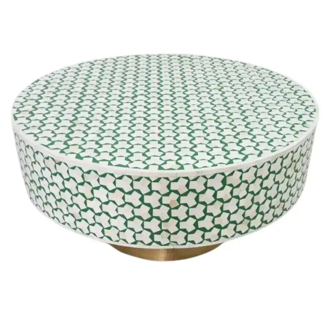 Taruga bone inlay coffee table with white and forest green star geometric mosaic top and sides on a brass pedestal base