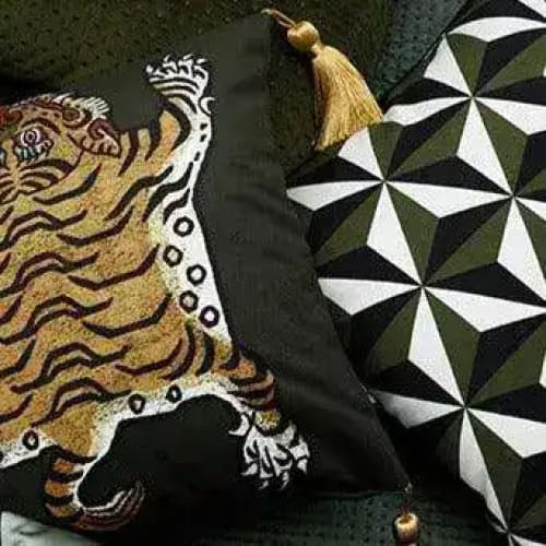 Tassel Tibetan Tiger Throw Pillow Cover in Caramel featuring a striking tiger design, perfect for adding a touch of exotic decor to your living space.