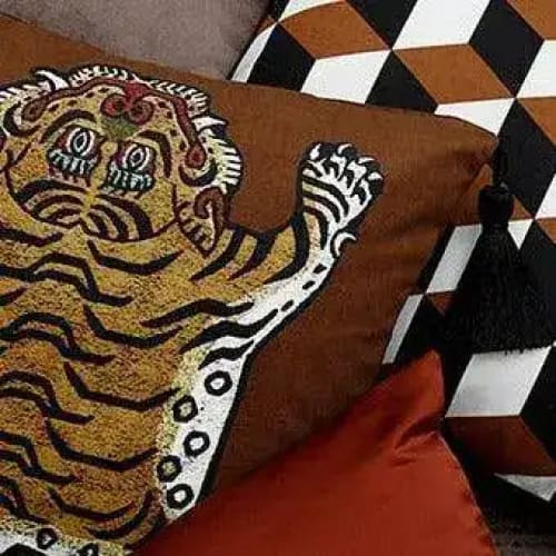 Caramel Tassel Tibetan Tiger throw pillow cover featuring a vibrant tiger design, perfect for adding a touch of exotic charm to your home decor.