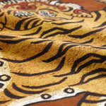 Caramel tassel Tibetan tiger throw pillow cover featuring a bold tiger design, perfect for adding a unique touch to your home decor.