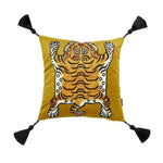 Tassel Tibetan tiger throw pillow cover in caramel color featuring a playful tiger design and decorative tassels.