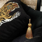 Tassel Tibetan Tiger throw pillow cover featuring a striking tiger design and a decorative golden tassel.