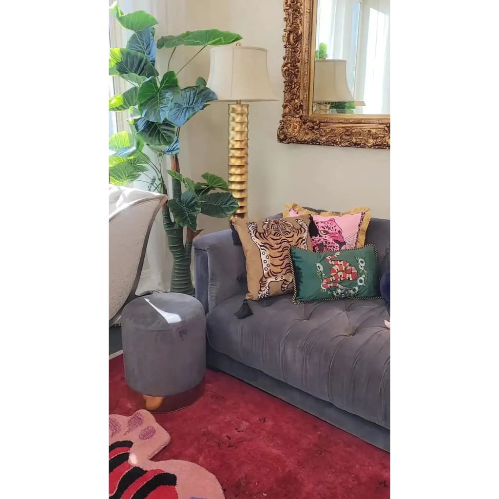 Tassel Tibetan Tiger throw pillow cover displayed on a stylish couch, enhancing home decor with vibrant colors and patterns.