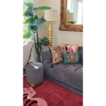 Tassel Tibetan Tiger throw pillow cover displayed on a stylish couch, enhancing home decor with vibrant colors and patterns.