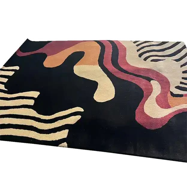 A vibrant hand-tufted wool rug featuring an abstract design with flowing curves in terracotta, cream, and black. Perfect for adding a contemporary touch to a large living room or dining room. This area rug brings warmth and style, making it an ideal choice for dining room area rugs or living room decor.