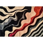 Top view of a contemporary area rug with abstract, wavy patterns in black, grey, and red hues. This wool rug, perfect for bedroom or office spaces, adds a modern touch to any interior.