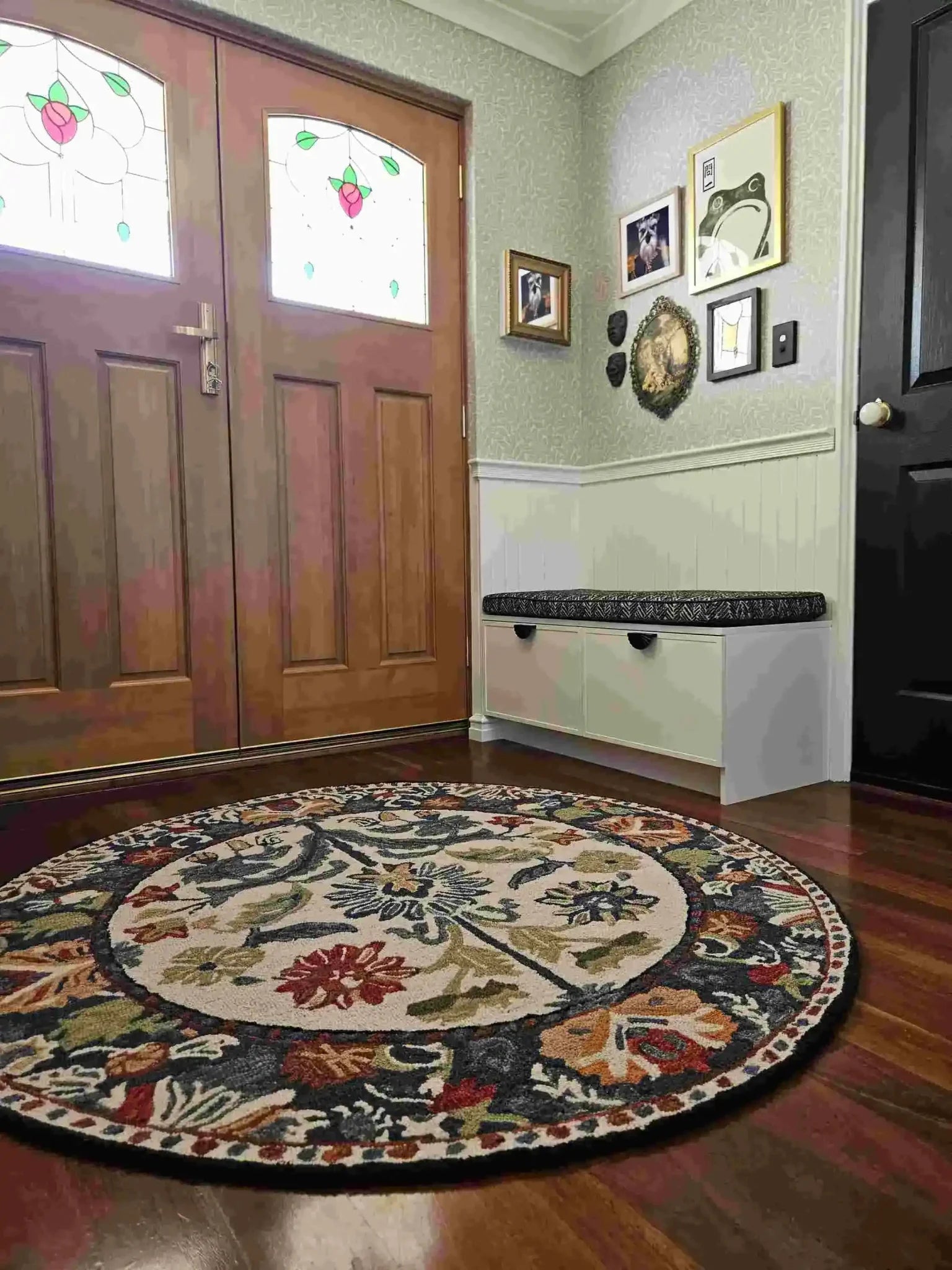 The Blossom Grace Hand Tufted Round Rug adds a touch of elegance to your dining room with its intricate floral patterns and rich colors. This wool area rug is perfect for both dining room carpets and living room settings, offering a warm and inviting feel.