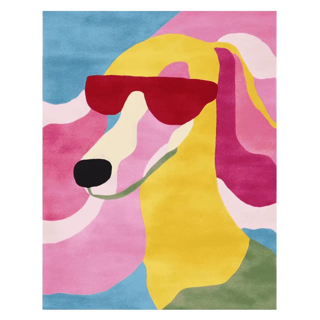 The Chill Dog Hand Tufted Area Rug features a vibrant, contemporary design with a playful dog wearing red sunglasses set against a colorful abstract background. This wool rug is perfect for adding a pop of color to any living room.