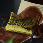 Throw pillow featuring a majestic Bengal tiger design on a golden background, perfect for home decor