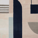 The Quiet Equation Hand Tufted Area Rug showcases a contemporary design with geometric shapes in muted tones of navy, beige, and gray. This 8x10 living room wool rug presents a modern aesthetic, ideal for elevating any space.