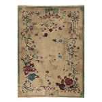 The Regal Bloom Hand Knotted Rug is an exquisite area rug showcasing a lush floral design. This 8x10 wool rug, perfect for living rooms, features intricate patterns with vibrant flowers on a neutral background, adding elegance and warmth to any space.