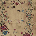 The Regal Bloom Hand Knotted Area Rug showcases a stunning display of floral patterns in vibrant colors on a neutral background, perfect for adding elegance to any living room. This 8x10 wool rug is ideal for those seeking a beautiful floral rug to complement their decor.