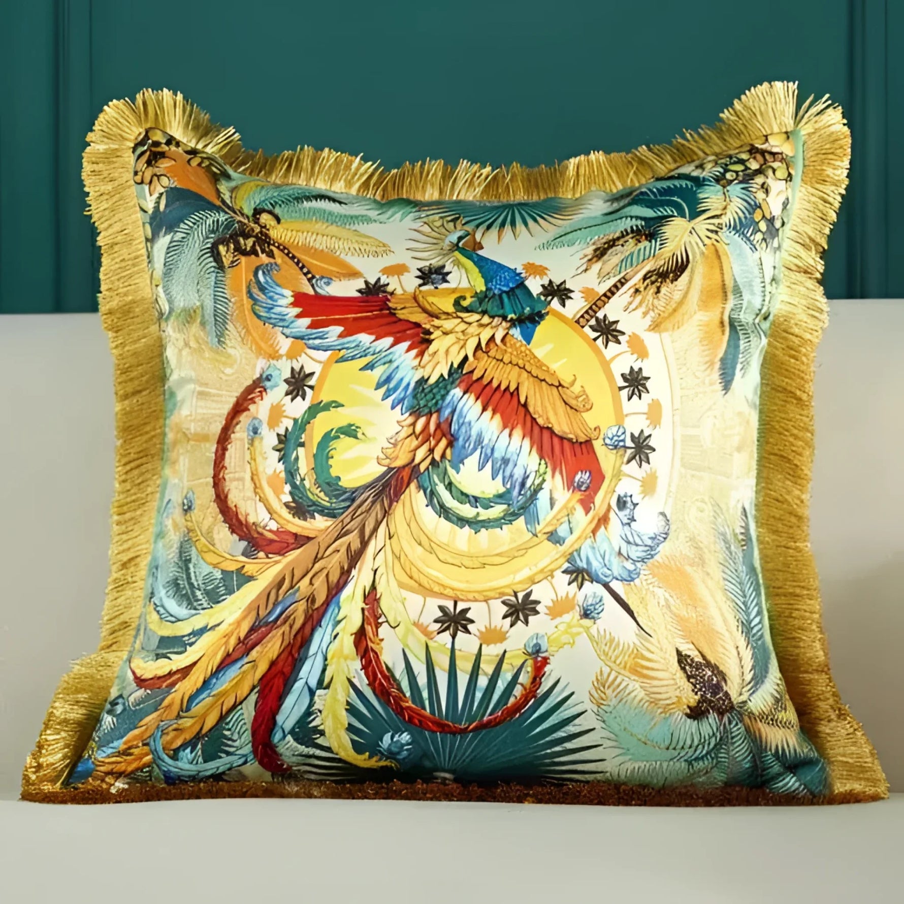 Colorful embroidered throw pillow featuring a vibrant bird design with intricate details and fringed edges, perfect for home decor.