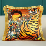 Vibrant throw pillow featuring a majestic tiger design with floral accents and a fringed border, perfect for adding a bold touch to any decor.