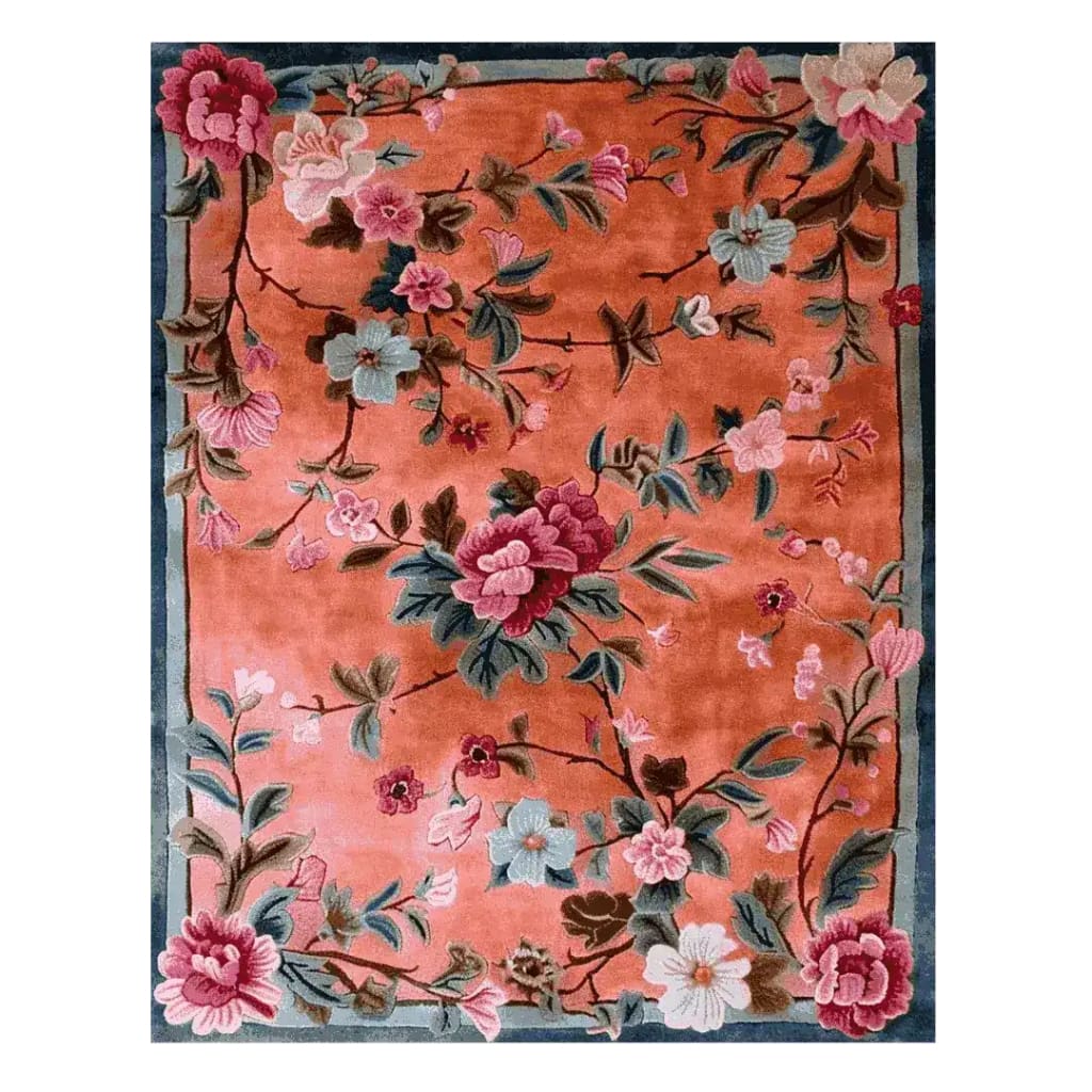 The Secret Garden Hand Knotted Rug is an exquisite area rug featuring a vibrant floral design, perfect for enhancing living room and dining room spaces. This wool rug's intricate patterns bring a touch of elegance to formal dining rooms, with its lush flowers and rich colors standing out beautifully against a warm background.