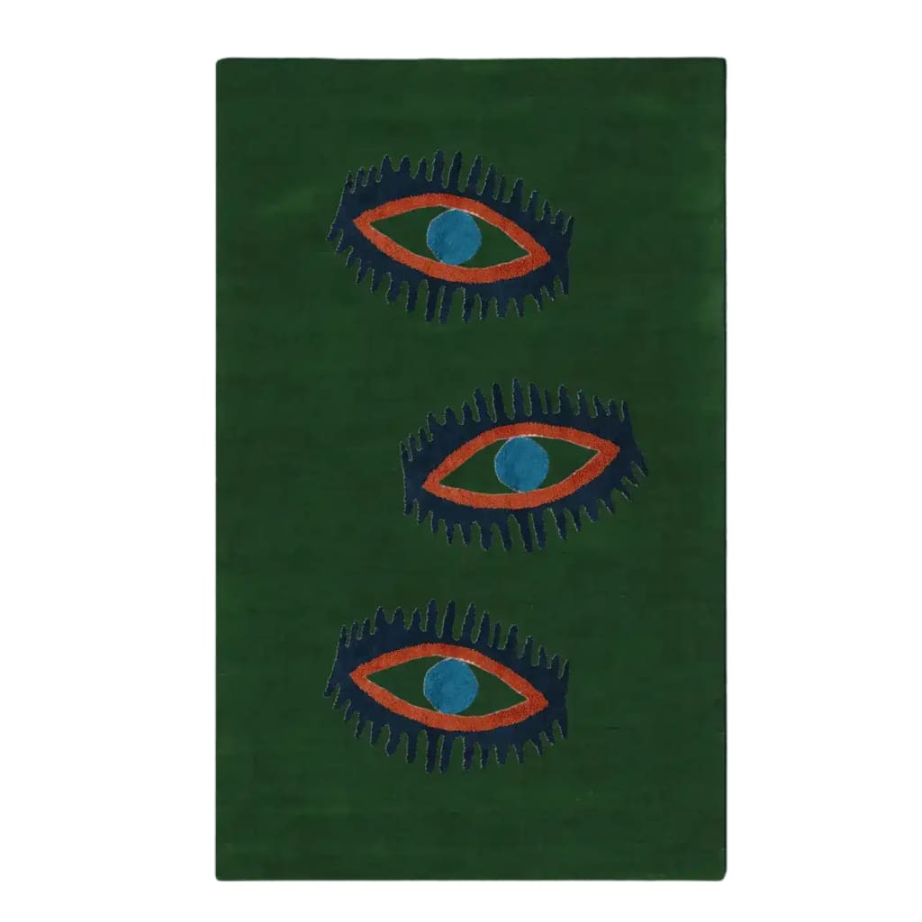 A top view of the Three Evil Eyes Green Hand Tufted Wool Rug, featuring a striking design of three abstract eyes in bold colors on a rich green background. This area rug is perfect as a dining table rug, adding a vintage touch to your dining room or bedroom decor. It also serves as an elegant kitchen rug or hallway runner rug.