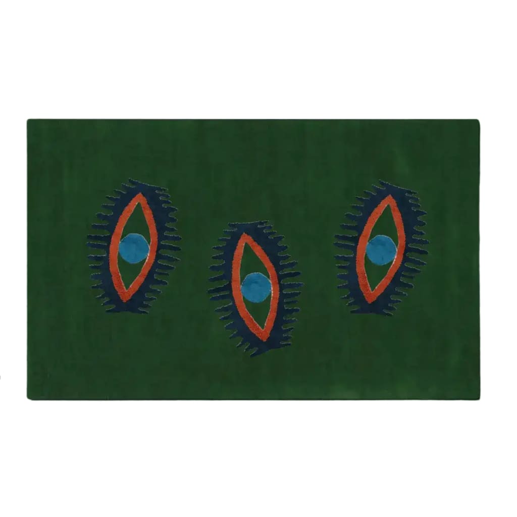 A vibrant green hand-tufted wool area rug featuring three abstract eye designs in blue and orange, perfect for adding a touch of vintage charm to any dining room or bedroom. Ideal as a dining table rug, kitchen runner rug, or hallway runner rug.