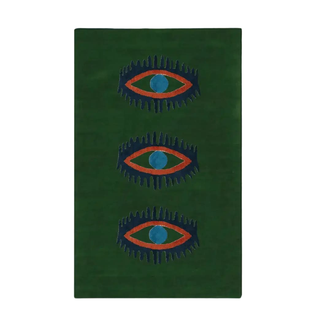 A vibrant green area rug featuring a unique design of three abstract blue and orange eyes. This hand-tufted wool rug adds a touch of vintage charm, perfect for enhancing spaces like kitchens, hallways, or bedrooms. Ideal as a bathroom runner rug or a stylish addition to any bedroom decor.