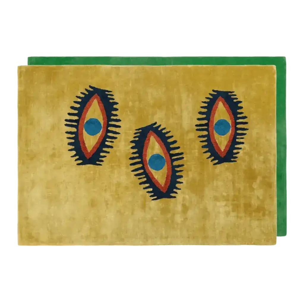 Vibrant area rug featuring a unique design of three abstract eyes, ideal for living room and dining room spaces. This hand-tufted wool rug adds a touch of vintage charm, perfect for both casual and formal dining room settings.