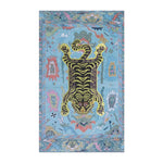 Tibetan tiger kitchen towel flat-lay, rectangular blue cotton with yellow-black tiger and colorful Tibetan-style decorative border