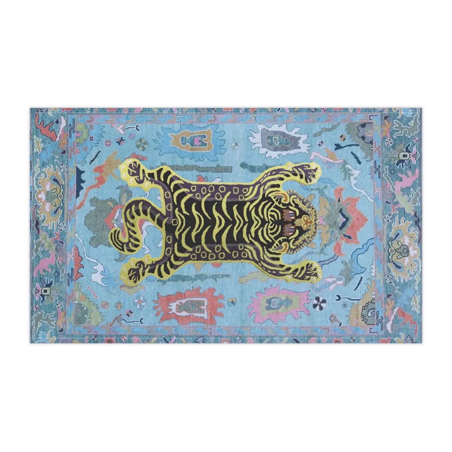 Tibetan tiger tea towel horizontal flat-lay, yellow-black striped tiger on light blue cotton with multicolor Tibetan border