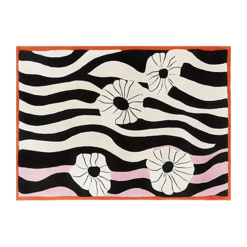 This area rug features a contemporary design with abstract black and white wavy lines and floral patterns, accented by a subtle pink hue. Ideal for living room rugs 8x10, this hand-tufted wool rug offers both style and comfort.