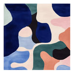 A vibrant, multi-colored square area rug with an abstract design, perfect for adding a contemporary touch to large living rooms. This hand-tufted wool rug showcases a harmonious blend of blues, greens, pinks, and neutrals, ideal for those seeking modern rugs for their living room.