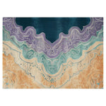 Top view of the Tidal Symphony Hand Tufted Wool Rug, showcasing a vibrant and abstract design with rich blue, purple, and beige colors. This contemporary area rug is perfect for adding a touch of elegance to any living room, highlighting the quality of a wool rug.