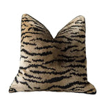 Tiger pattern velvet decorative throw pillow cover featuring bold black stripes on a beige background, perfect for adding a stylish touch to any home decor.