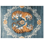 A beautifully crafted Tiger's Grace Hand Tufted Area Rug featuring a striking abstract design with two tigers lying amidst floral patterns. This wool rug is perfect for large living rooms, adding a vintage touch with its intricate floral and tiger motifs. Ideal for those seeking area rugs for living rooms that blend elegance and boldness.