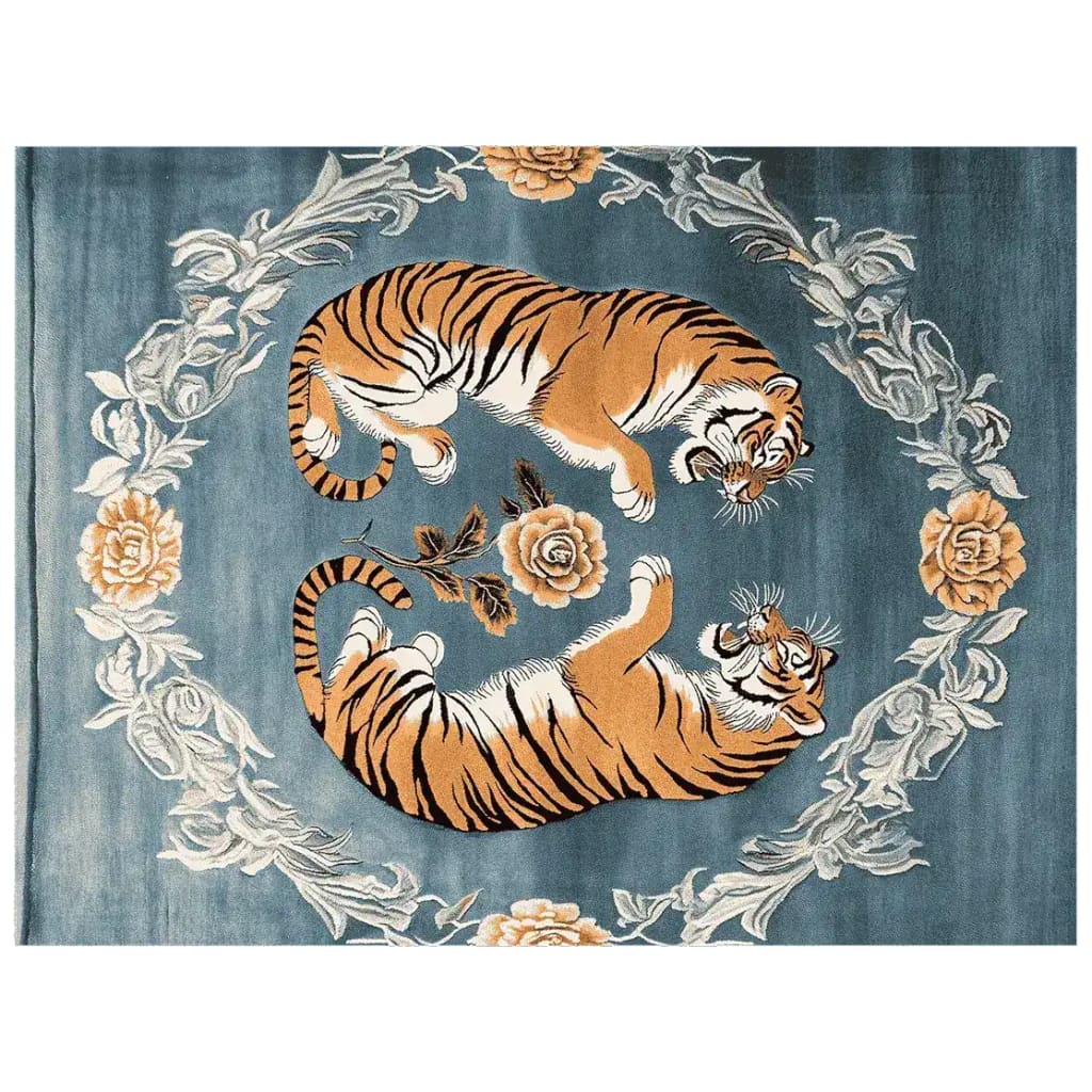A beautifully crafted Tiger's Grace Hand Tufted Area Rug featuring a striking abstract design with two tigers lying amidst floral patterns. This wool rug is perfect for large living rooms, adding a vintage touch with its intricate floral and tiger motifs. Ideal for those seeking area rugs for living rooms that blend elegance and boldness.