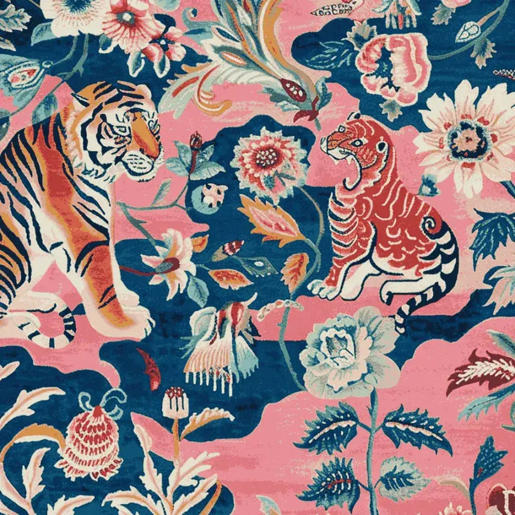 Vibrant hand tufted area rug featuring a whimsical design of tigers surrounded by blooming flowers on a rich pink and blue background. Perfect as a wool rug for the living room, this 8x10 square area rug brings a lively touch to any space.