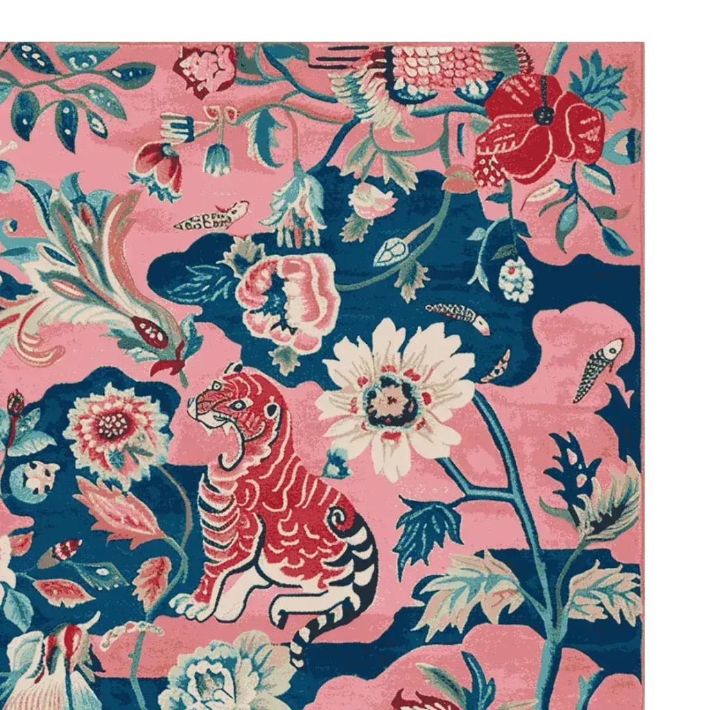 Vibrant hand-tufted wool area rug featuring an abstract tiger design amidst blooming flowers on a pink and blue background. Perfect as a square area rug for living room decor, adding a touch of artful elegance to any space.