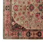 This image showcases a section of the Timeless Artistry Hand Tufted Wool Rug, featuring an intricate vintage floral design in shades of pink and cream. Perfect for adding a classic touch to any area, this 8x10 wool rug is ideal for living rooms seeking an elegant, vintage aesthetic.