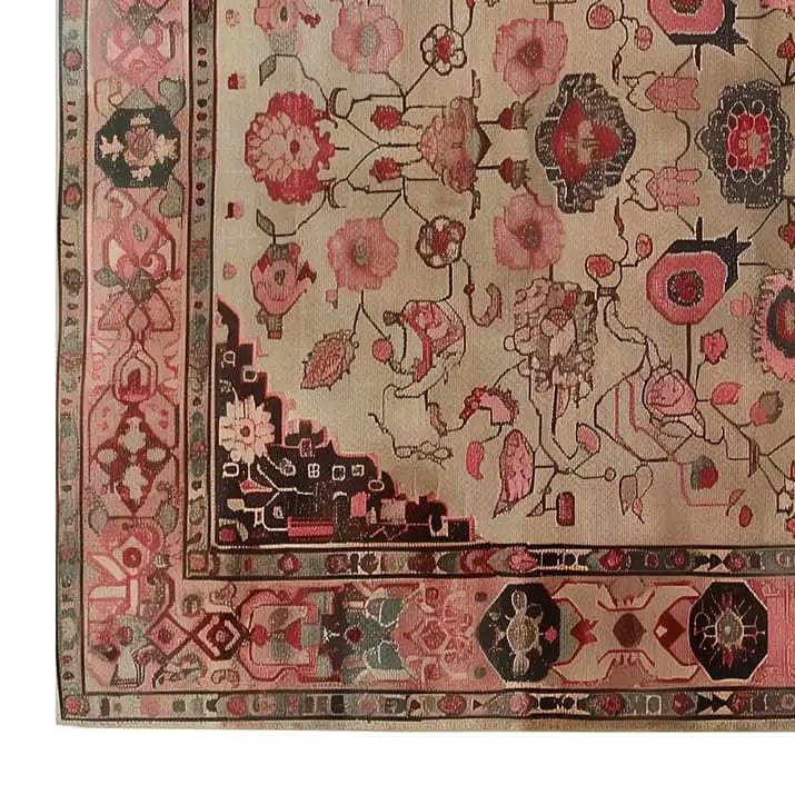 This image showcases a section of the Timeless Artistry Hand Tufted Wool Rug, featuring an intricate vintage floral design in shades of pink and cream. Perfect for adding a classic touch to any area, this 8x10 wool rug is ideal for living rooms seeking an elegant, vintage aesthetic.