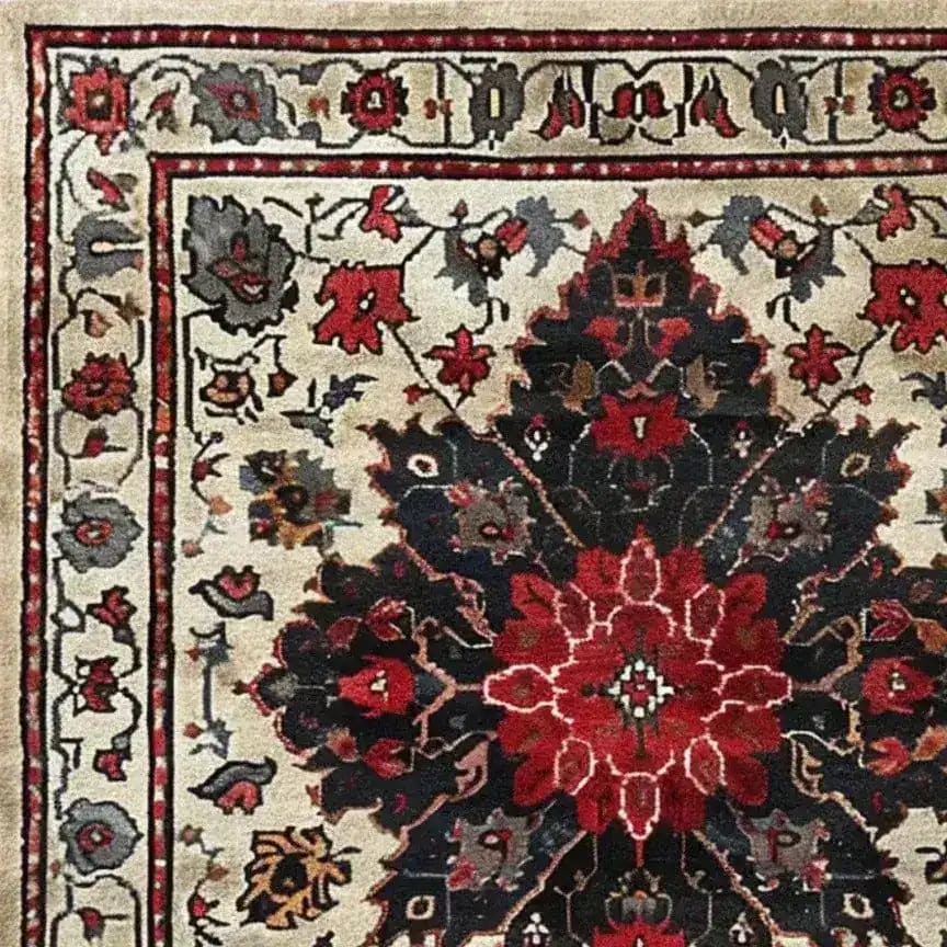 Close-up view of the Timeless Floral Medley Hand Knotted Wool Rug, showcasing intricate Persian floral designs in rich red and black hues. Perfect for adding a vintage touch to your living room or office, this 8x10 area rug exudes elegance and warmth.